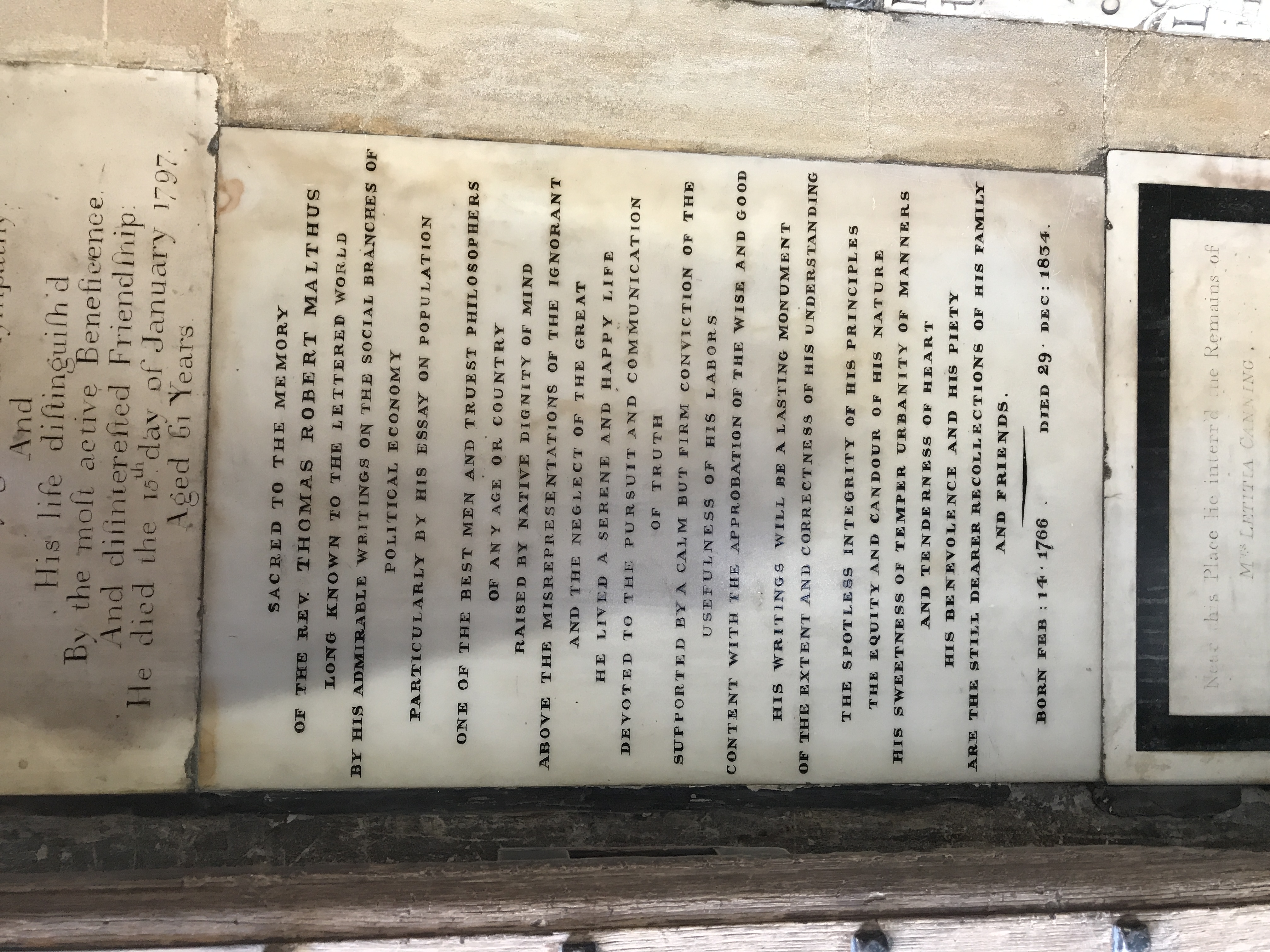 Thomas Malthus's memorial stone in Bath Abbey