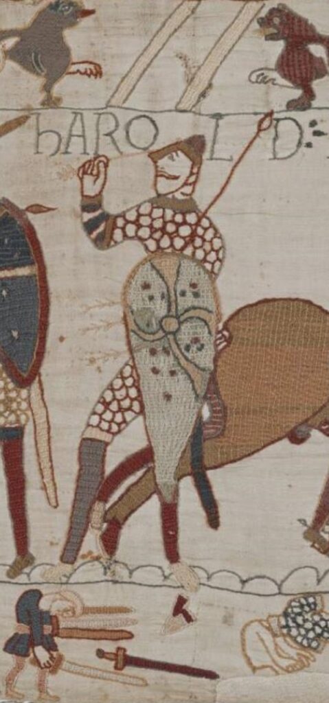 Harold holding the arrow that pierced his eye.