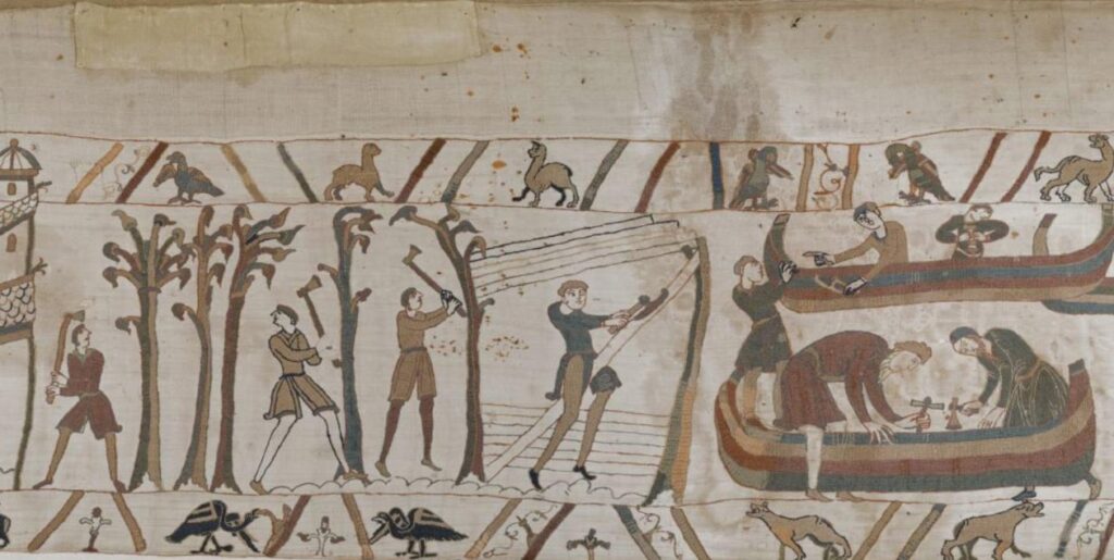 The preparations begin, in the Bayeux Tapestry, with William's men cutting down trees to build his ships.