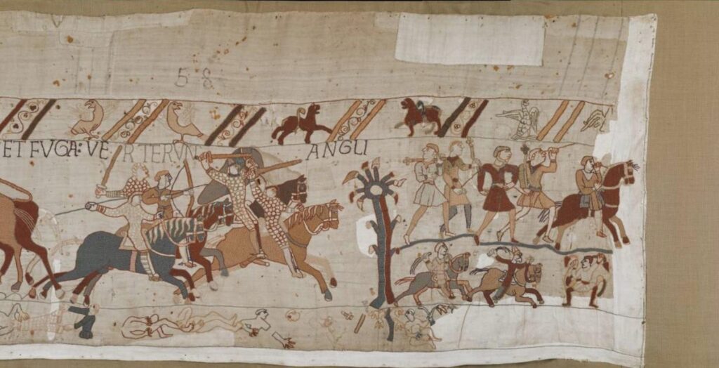The last scene of the Bayeux Tapestry shows French soldiers chasing the English army.