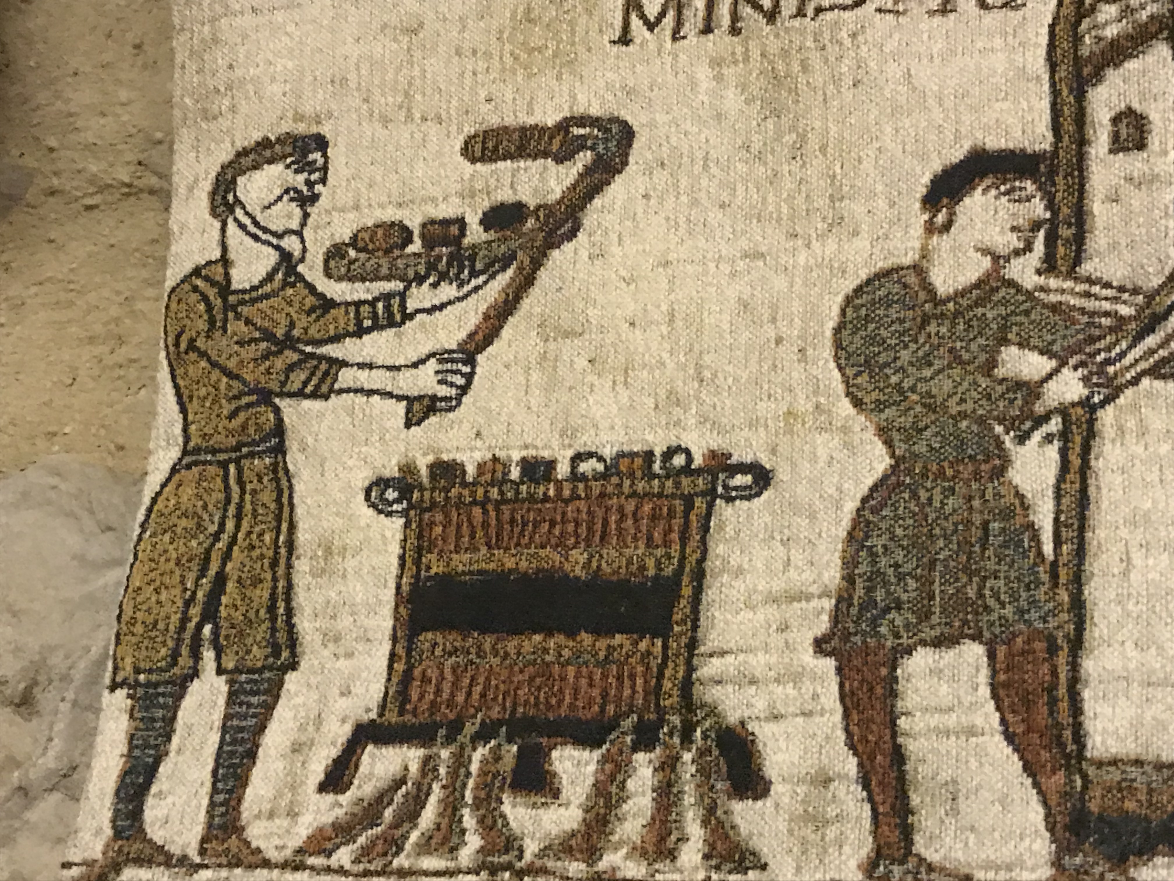 A feast being prepared for William after he landed in England, just before the Battle of Hastings in the Bayeux Tapestry.
